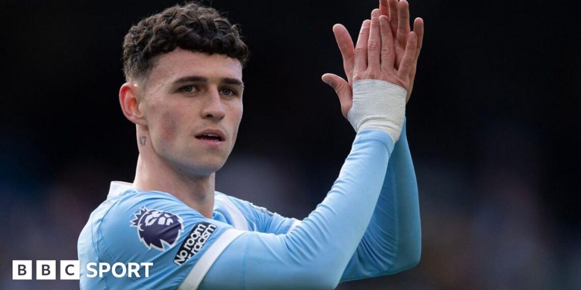 Phil Foden claps