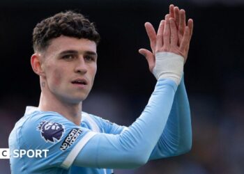 Phil Foden claps