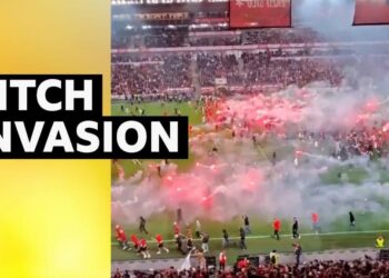 Fans invading the pitch