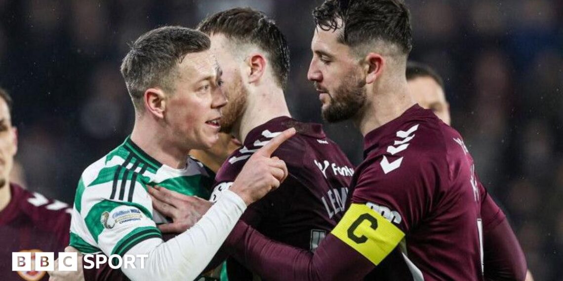 Celtic's Callum McGregor clashes with Hearts' Blair Spittal (not in frame) during a William Hill Premiership match between Heart of Midlothian and Celtic at Tynecastle Park, on January 25, 2026, in Edinburgh, Scotland.