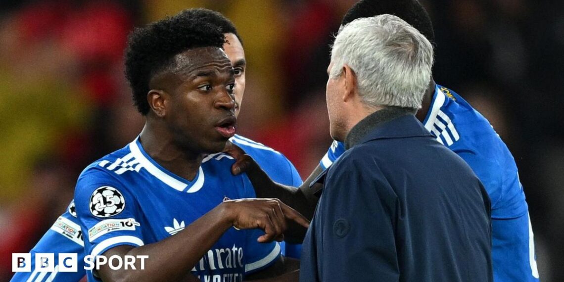 Vinicius Junior in conversation with Jose Mourinho