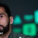 Close-up of Real Madrid head coach Alvaro Arbeloa, who has dark hair and beard and is wearing a green top