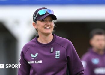 Sarah Taylor smiles during practice
