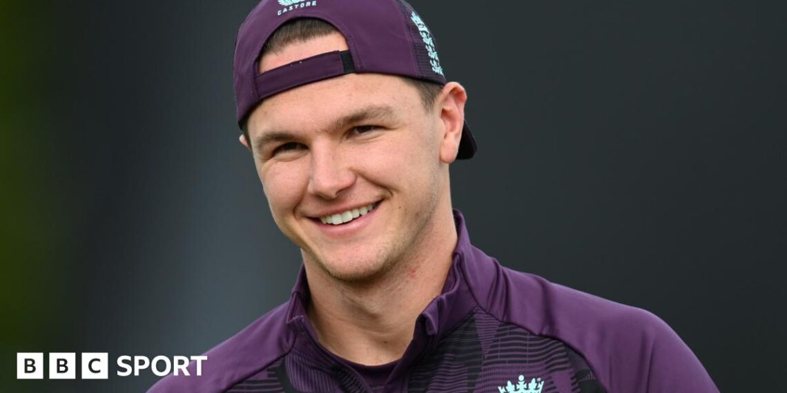 Sonny Baker, wearing a cap, smiles during England training