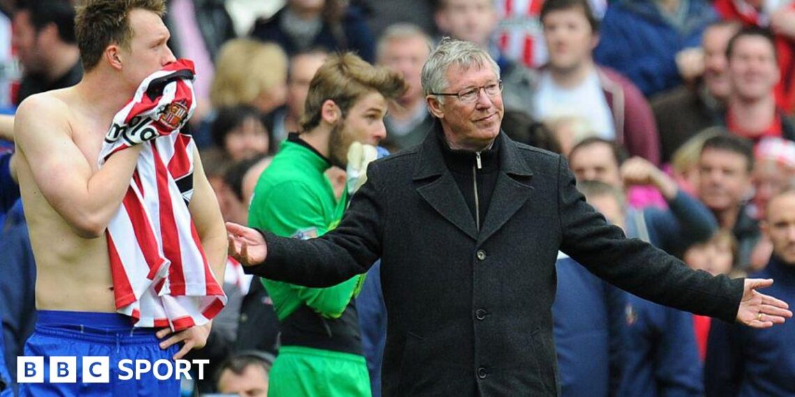 Phil Jones and Sir Alex Ferguson look on in despair