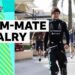 Kimi Antonelli and George Russell walking together dressed in Mercedes race suit