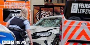 Two killed and many injured after car driven into crowd in German city of Leipzig
