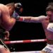 Oleksandr Usyk lands a punch on Rico Verhoeven