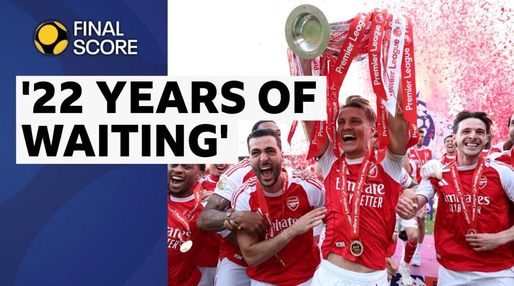 Arsenal celebrate winning the 2025-26 Premier League by lifting their trophy