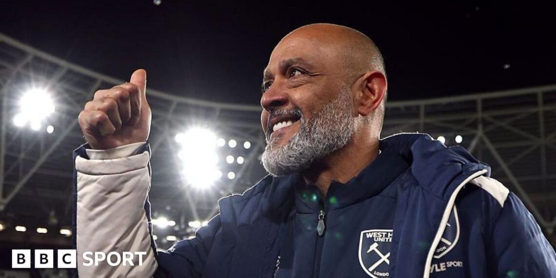 Nuno Espirito Sants gives the thumbs up to fans
