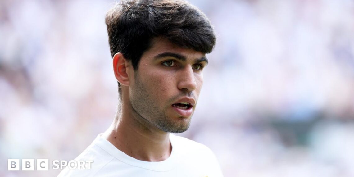 Carlos Alcaraz looks on during the Wimbledon final in 2025