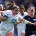 Maud Muir carries the ball
