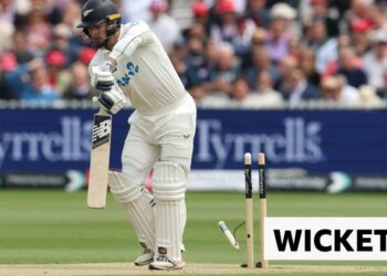 New Zealand's Nathan Smith is bowled by England's Josh Tongue.