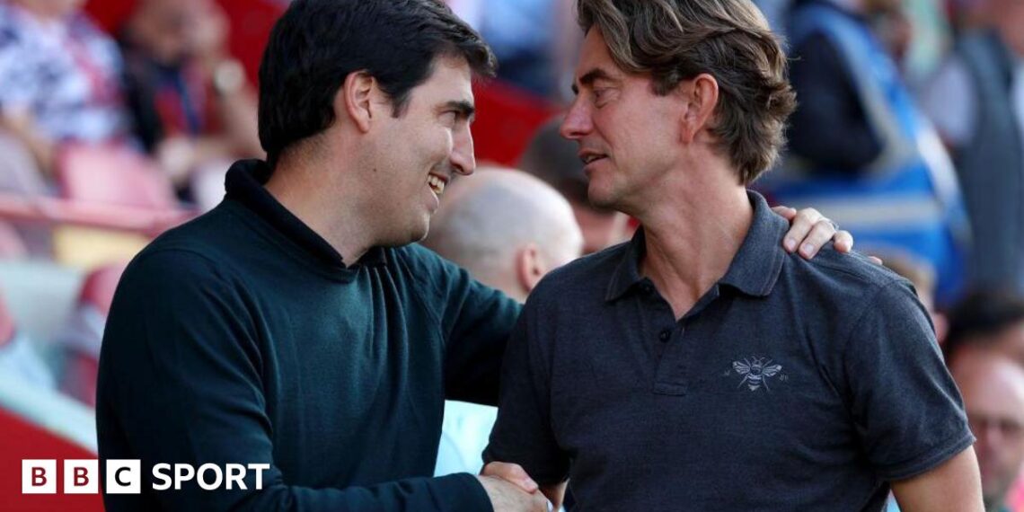 Andoni Iraola shaking hands with former Tottenham manager Thomas Frank