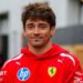 Charles Leclerc poses in the paddock ahead of the Canadian Grand Prix