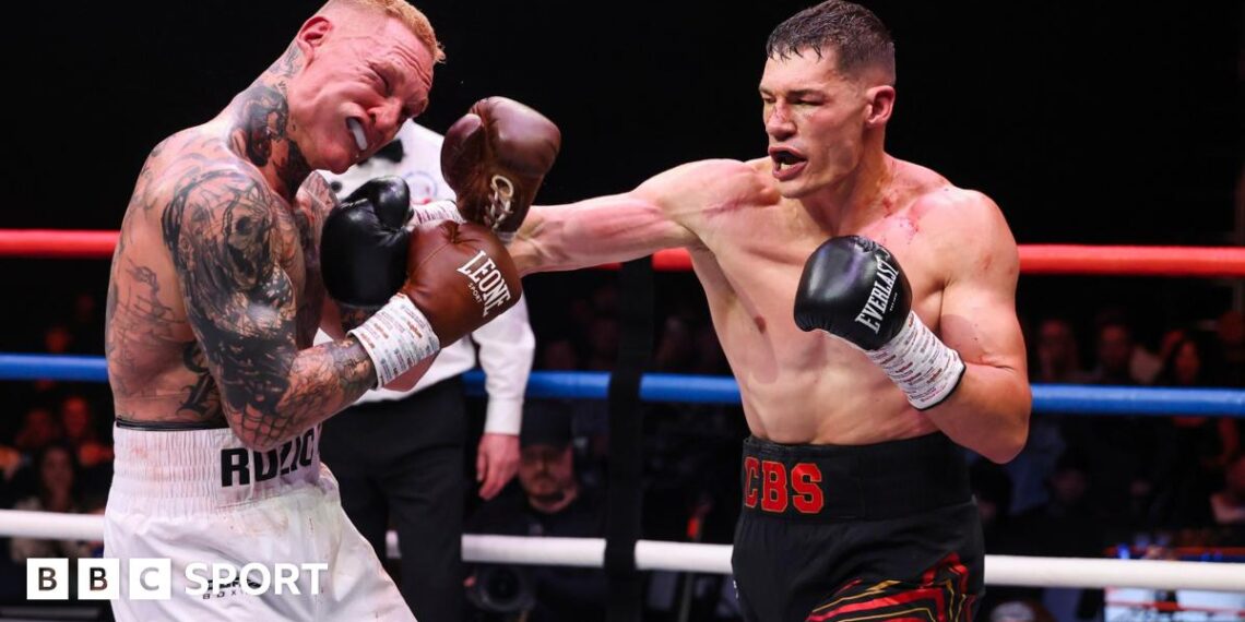 Chris Billam-Smith and Ryan Rozicki trade blows in the ring