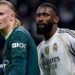 Manchester City striker Erling Haaland stands next to Real Madrid defender Antonio Rudiger during the Uefa Champions League match between the two teams at the Estadio Santiago Bernabeu