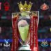 The Premier League trophy with red ribbons on it, surrounded by the crests of the 20 clubs in the English top flight in the 2026-27 season
