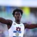 Ja'Kobe Tharp celebrates after breaking the 110m hurdles world record at the NCAA championships in June 2026