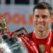 James Milner with the Premier League trophy after Liverpool's title win in 2020