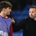 Lewis Koumas with Wales boss Craig Bellamy