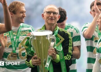 Martin O'Neill with the Scottish Premiership trophy