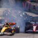 McLaren's Lando Norris leads the field into the first corner of the 2025 Monaco Grand Prix
