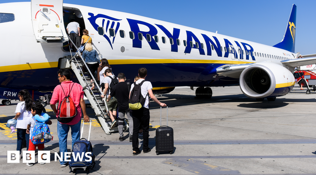 Ryanair investigated over charging parents to sit with children