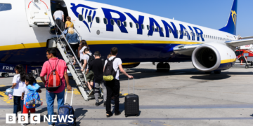 Ryanair investigated over charging parents to sit with children