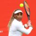Serena Williams hits a return during practice at Queen's