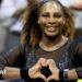 Serena Williams does a heart symbol with her hands while playing at the 2022 US Open