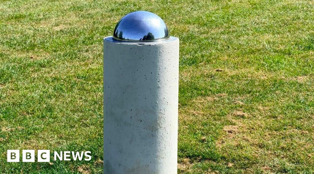 Village solar system model shows planets and stars