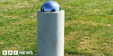 Village solar system model shows planets and stars