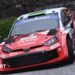 Elfyn Evans' red and white Toyota Yaris Rally1 car corners at Rally Japan