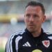 Craig Bellamy speaks to the media