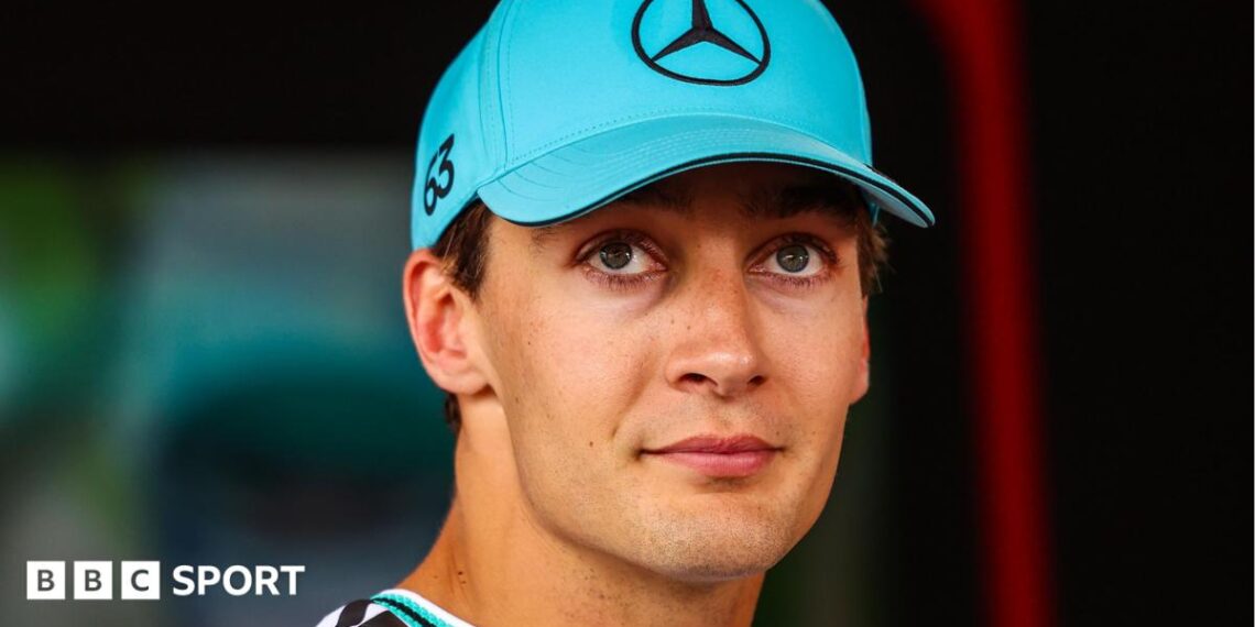 George Russell pictured wearing a Mercedes cap at the Monaco Grand Prix