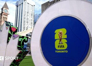 The Toronto sign decorated with FIFA World Cup graphics is seen at Nathan Phillips Square