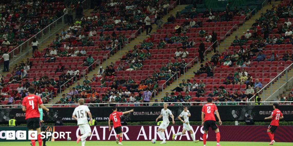 South Korea and Czech Republic play in front of a stand with a number of empty seats